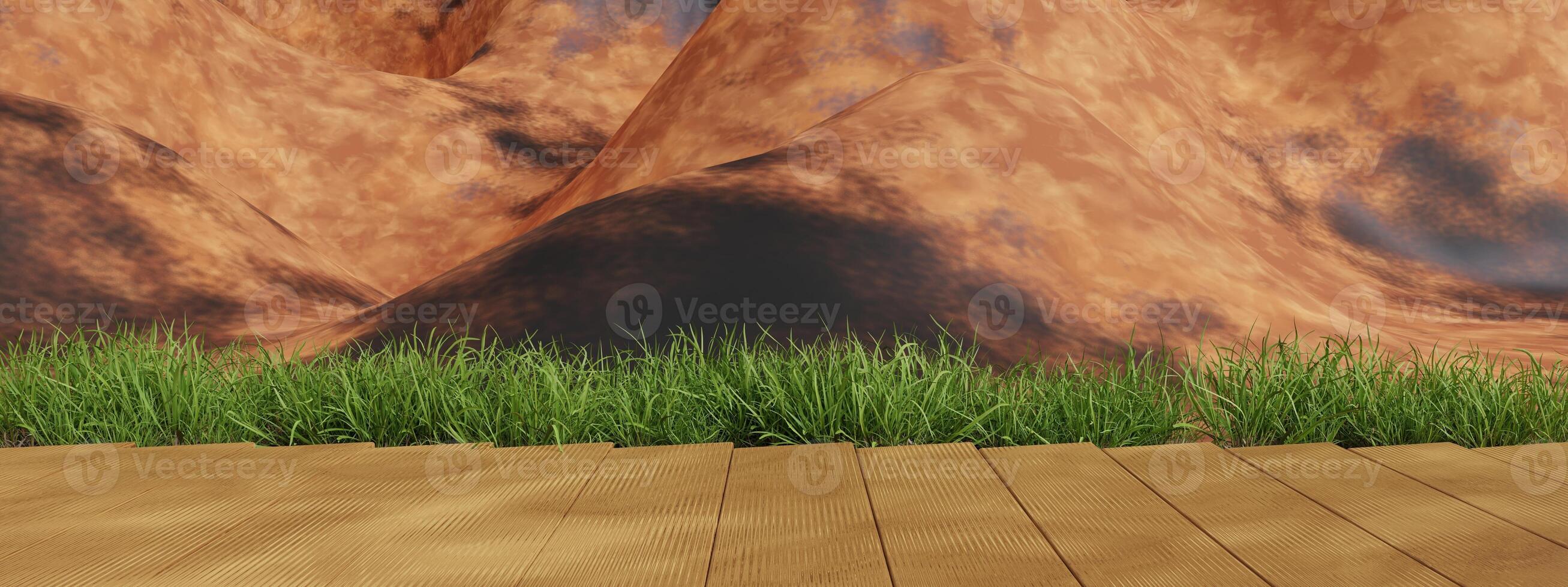 Wooden platform with green grass in front of a rocky mountain background photo