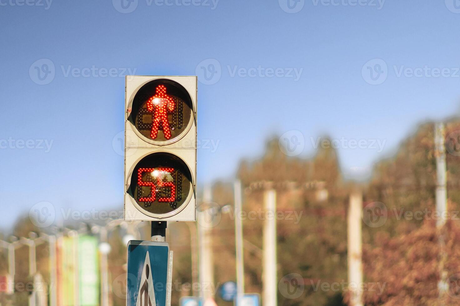 Stop traffic light for a pedestrian people with stopwatch. Red sign with timer photo