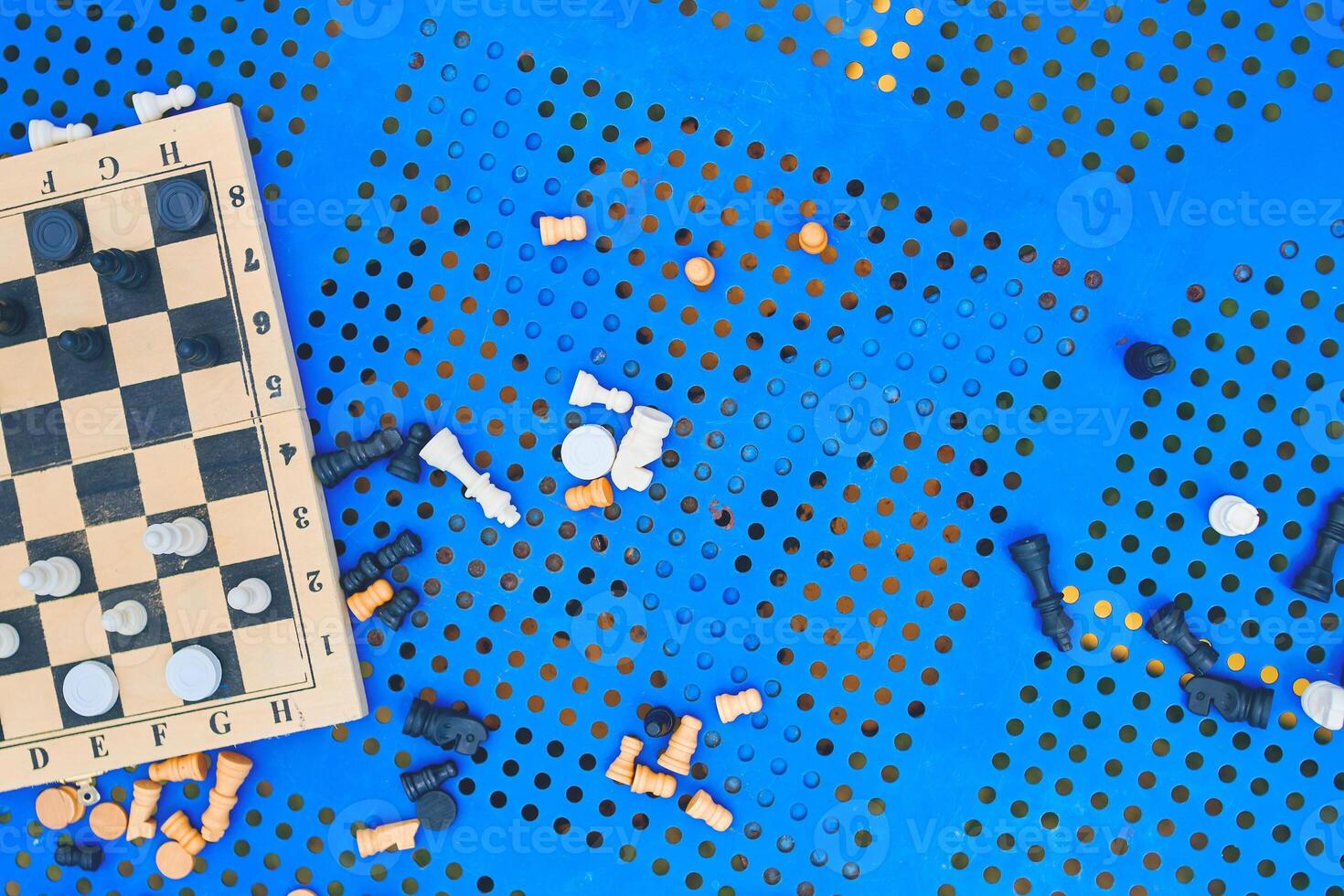Scattered chess summer day on the blue table in the Park photo