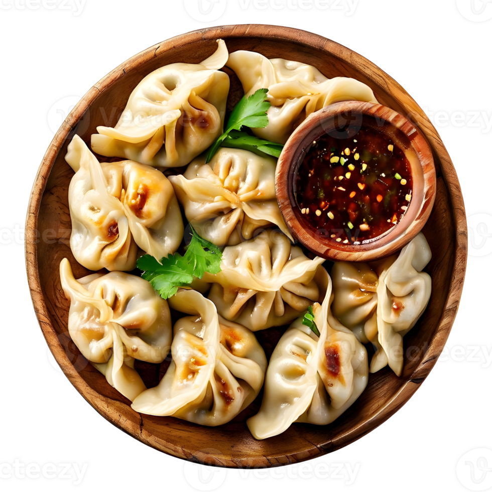 Dumpling momos with sauce in a wooden plate isolated on transparent background, cut out, or clipping path. png