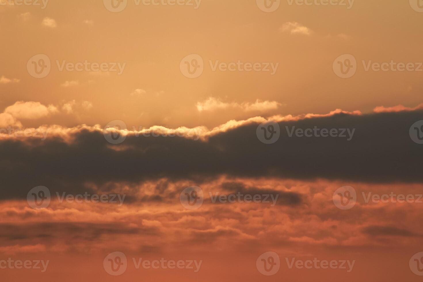 Close up view of sun hidden behind clouds photography photo
