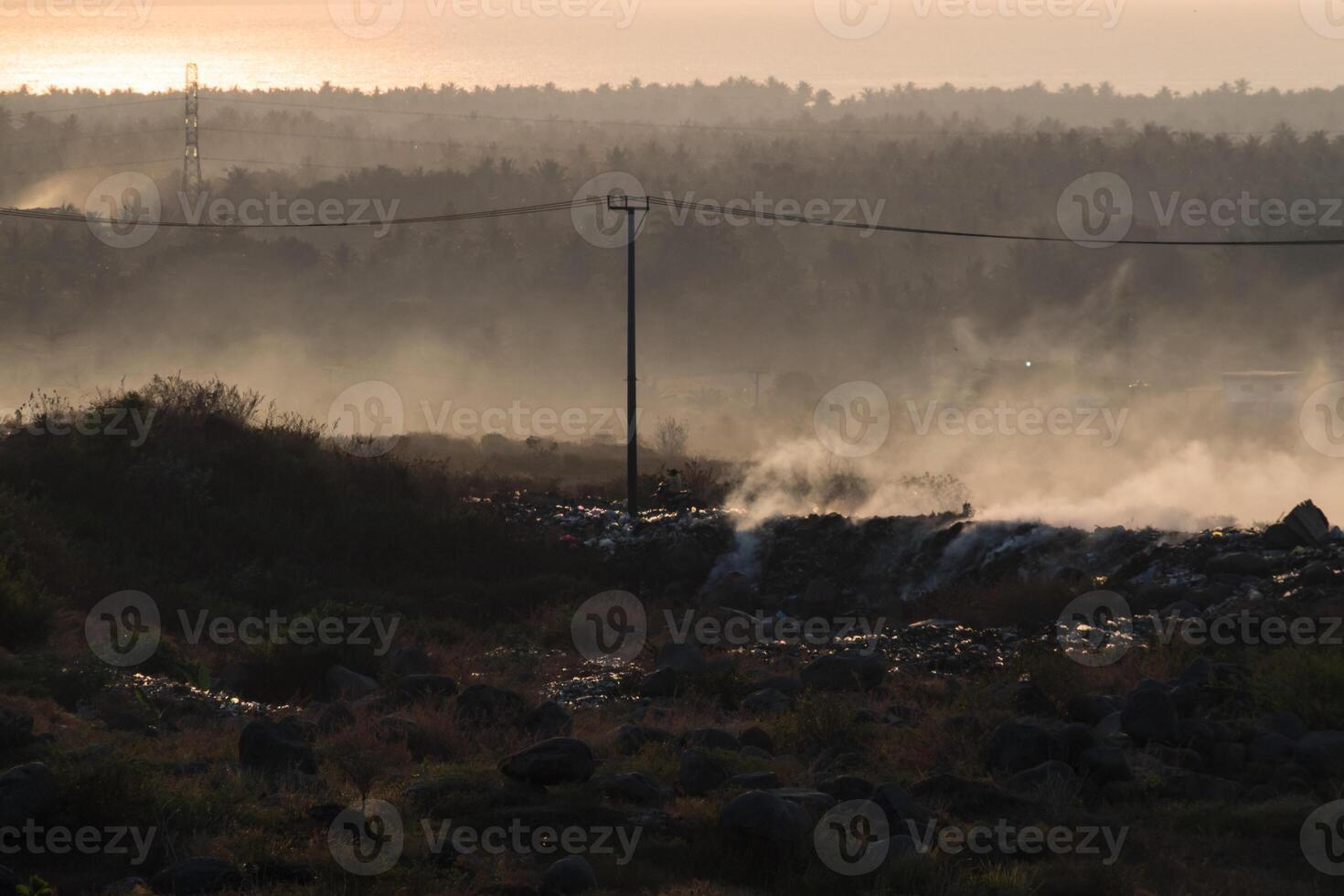 Misty morning atmosphere in Pekosong village, Lombok, Indonesia photo