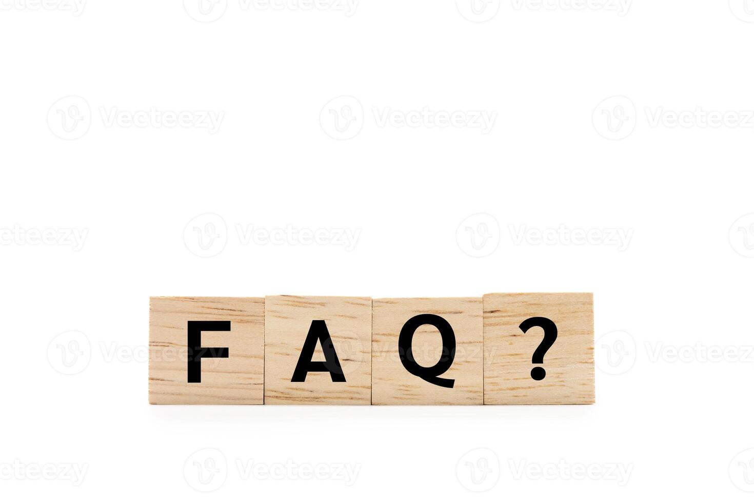 Wooden blocks with FAQ text isolated on white background. wooden blocks with the word FAQ frequently asked questions. Copy space and Clipping path. photo