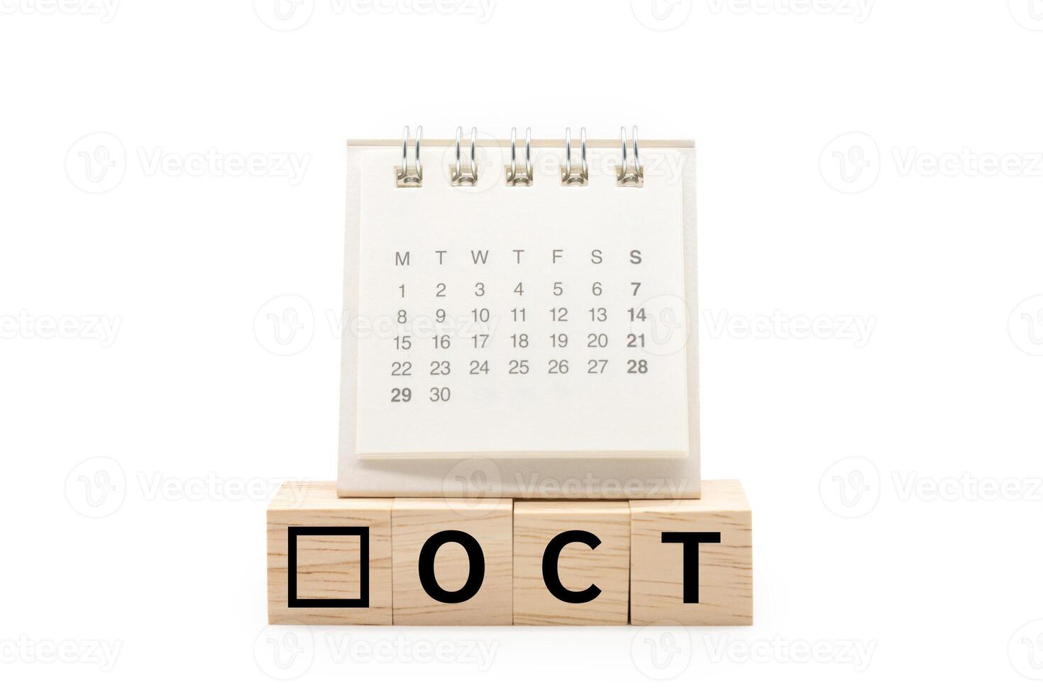 Calendar on Wooden blocks with OCT text isolated on white background. October and Calendar concept. Copy space. photo