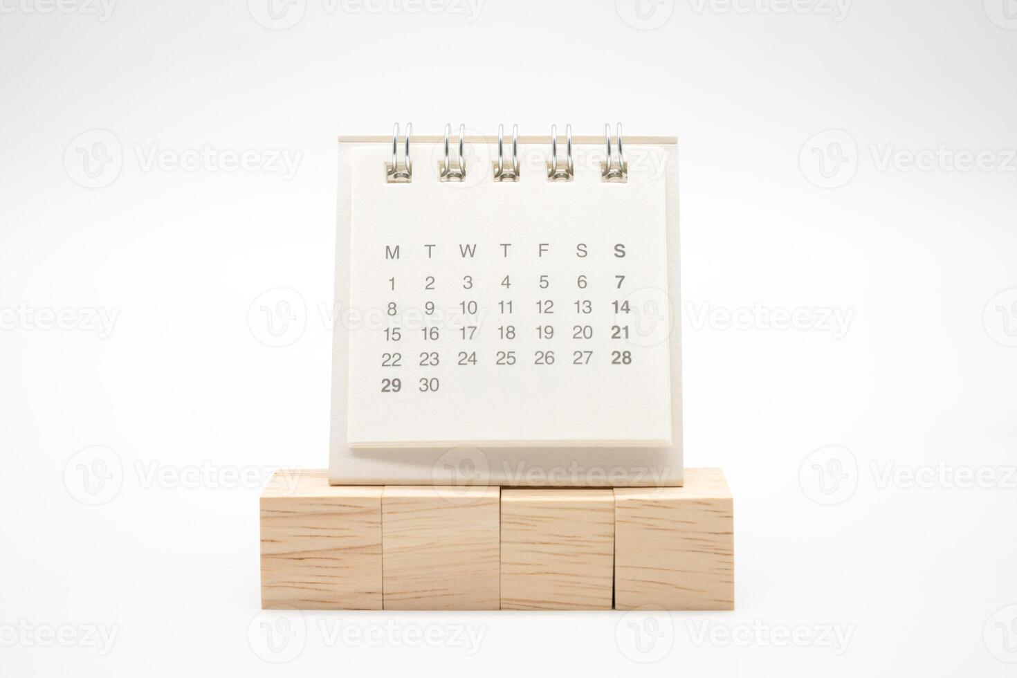 Blank wooden blocks and Calendar on white background with copy space for input wording and infographic icon. Wooden blocks with Calendar. photo