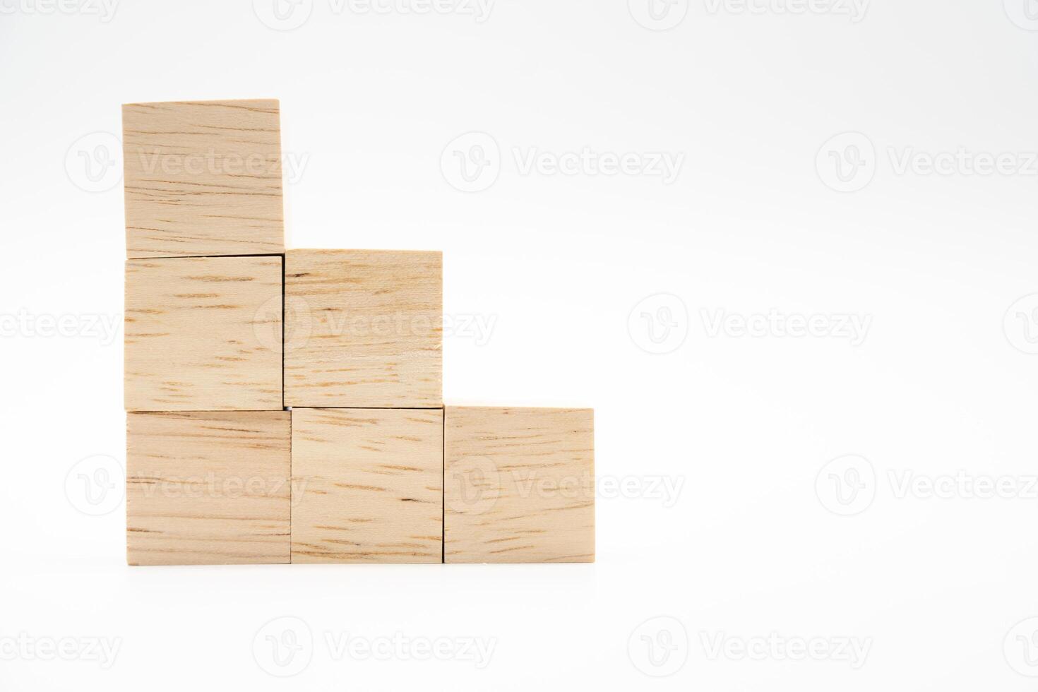 Pyramid of empty wooden blocks with copy space. Blank wooden cubes for wording and infographic icon. photo