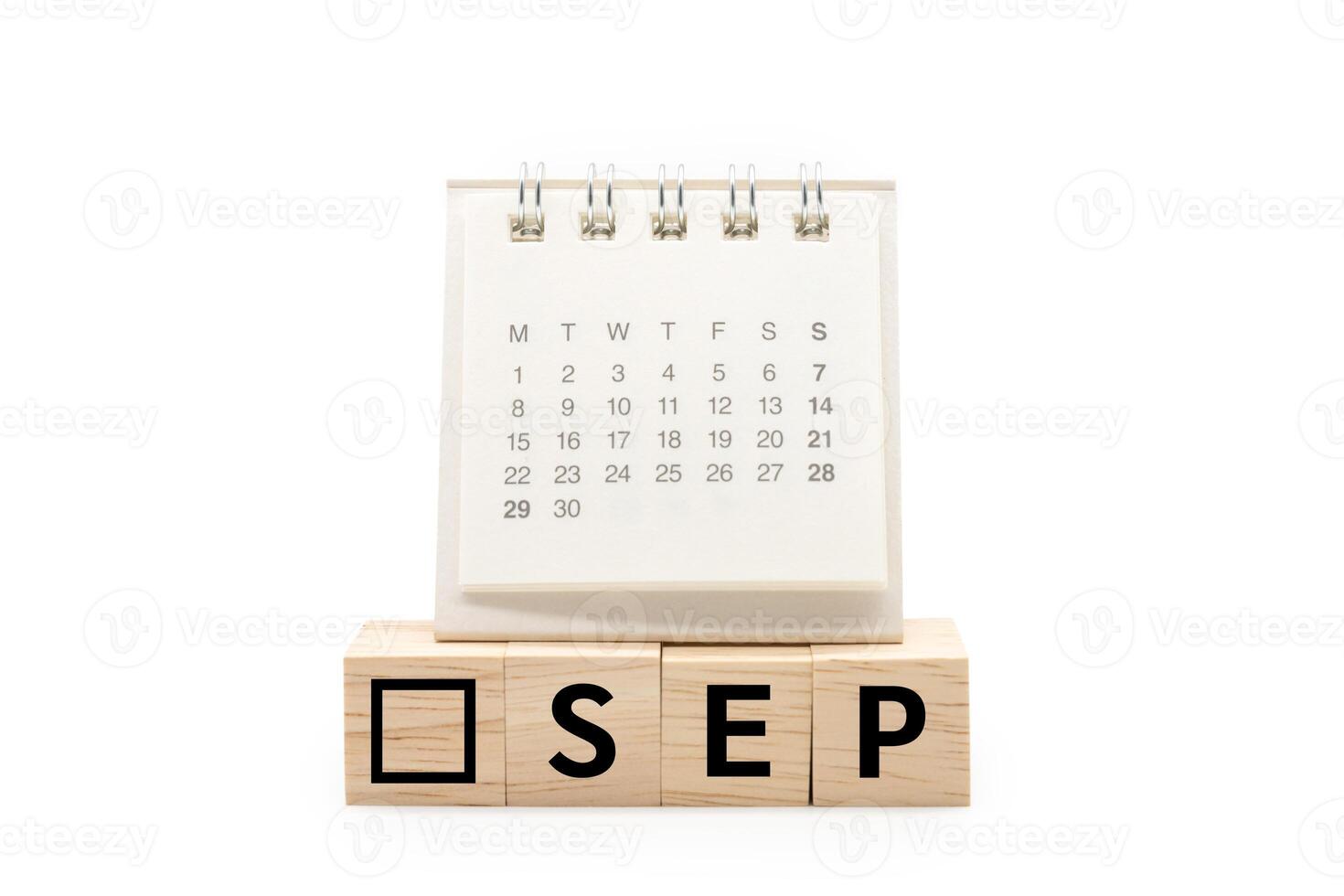 Calendar on Wooden blocks with SEP text isolated on white background. September and Calendar concept. Copy space. photo