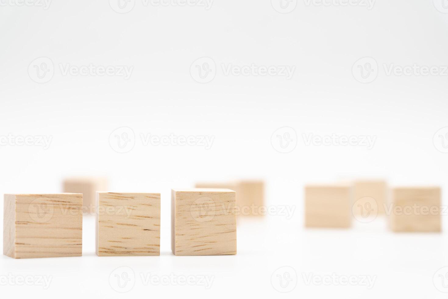 Wooden cube or wooden blocks on isolated background. Pile of wood block. Copy, empty space for text. photo