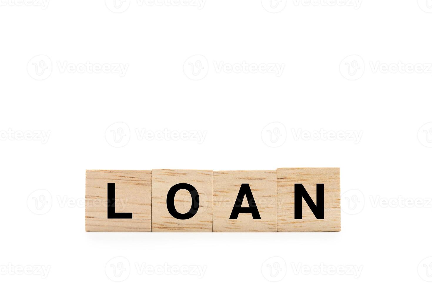 LOAN word wooden blocks isolated on white background. copy space and clipping path. Real estate market and finance concept. photo