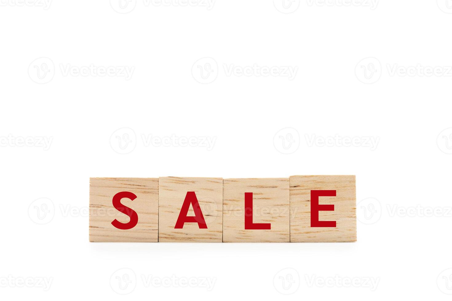 Red SALE word wooden blocks of business concept isolated on white background. Copy space and Clipping Path. Financial, Economic, Business, Marketing. photo