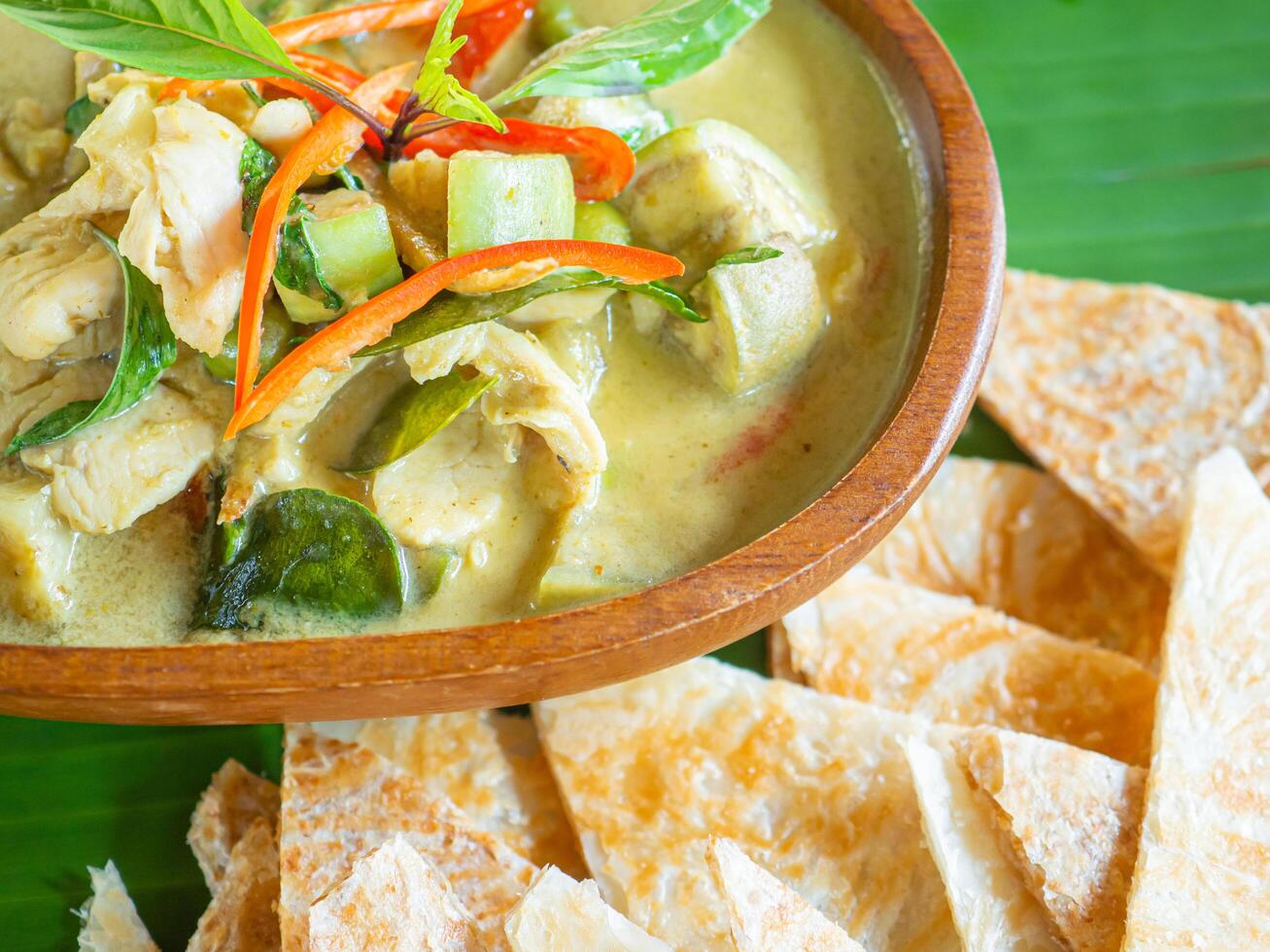 Roti with green curry chicken. Close-up photo. Muslim foods concept photo