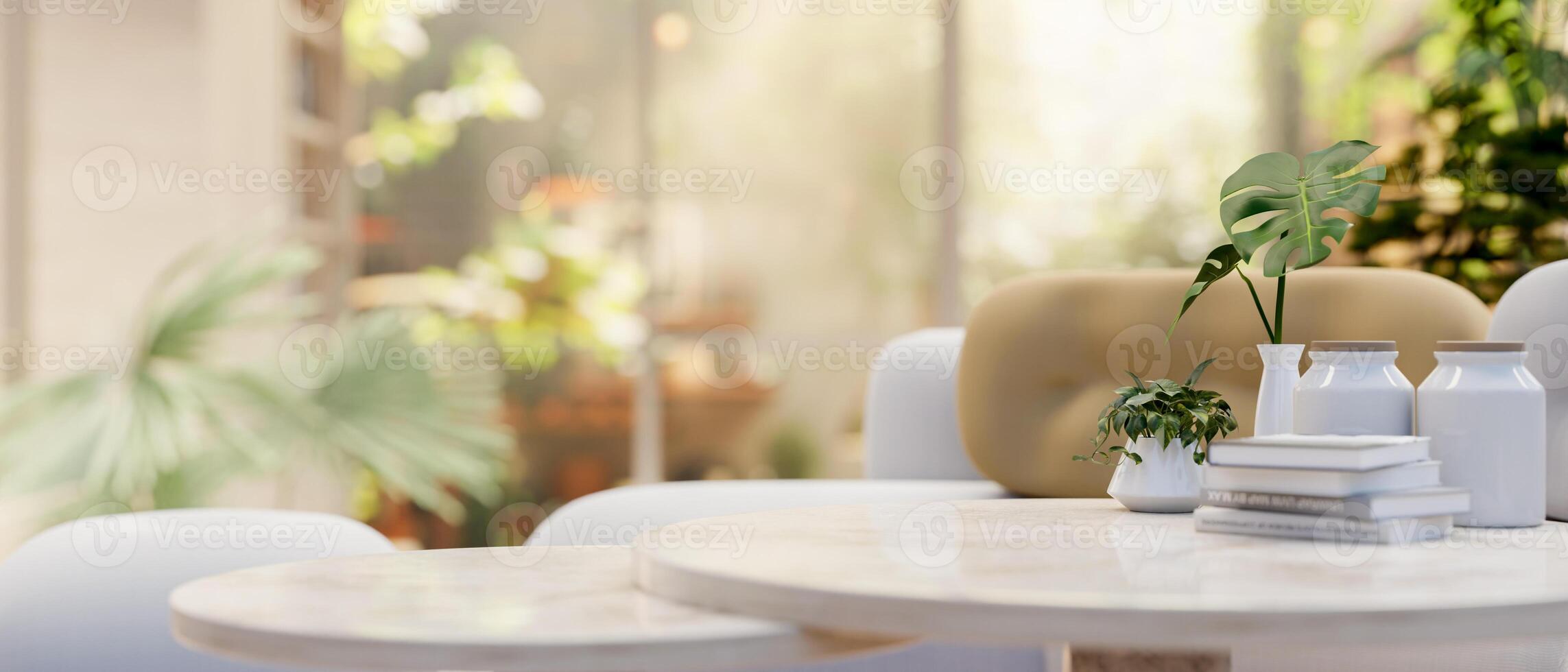 A modern neutral marble coffee table with a blurred background of a beautiful sunny home garden view photo