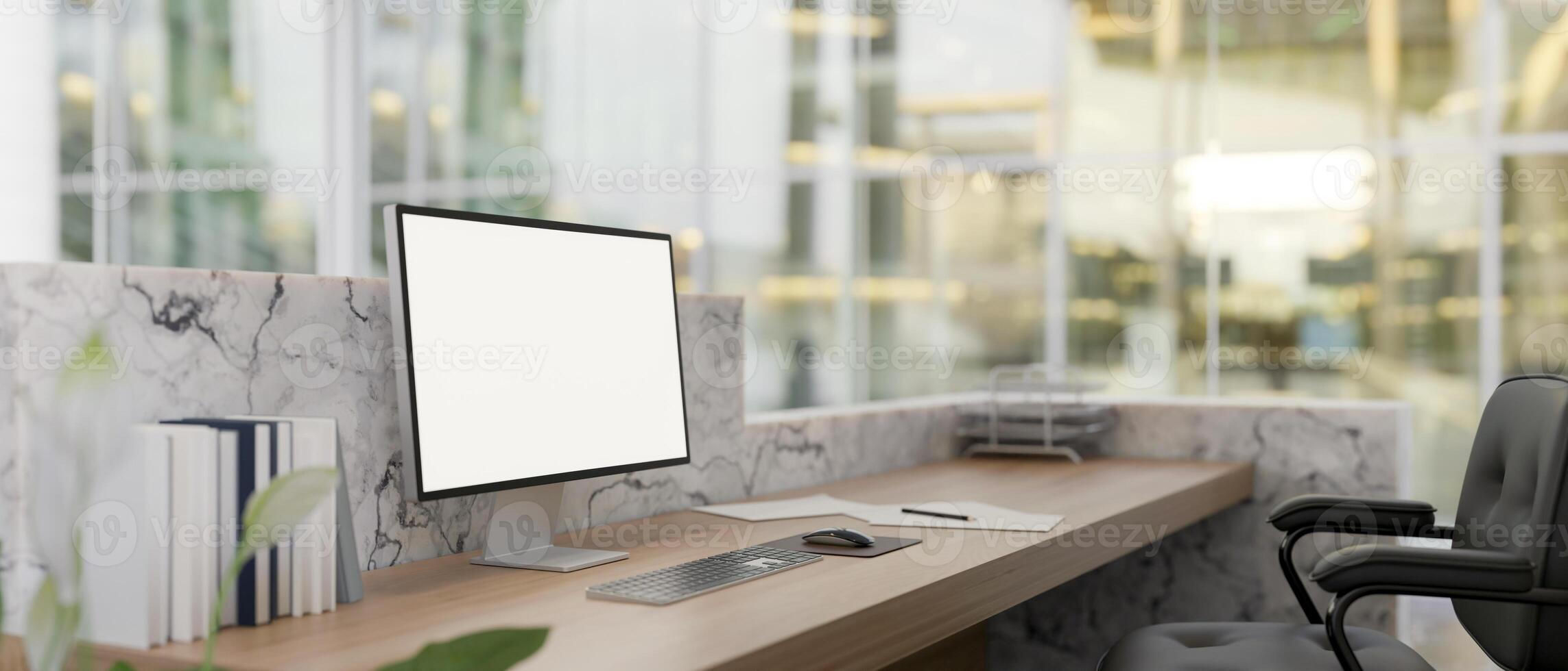 A computer mockup on a modern marble lobby reception counter. office reception, hotel lobby photo