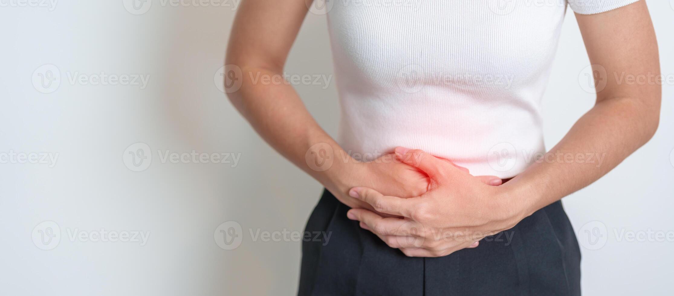 Woman having Stomach pain. Ovarian and Cervical cancer, Cervix disorder, Endometriosis, Hysterectomy, Uterine fibroids, Reproductive system, menstruation, diarrhea, digestive system and Pregnancy photo