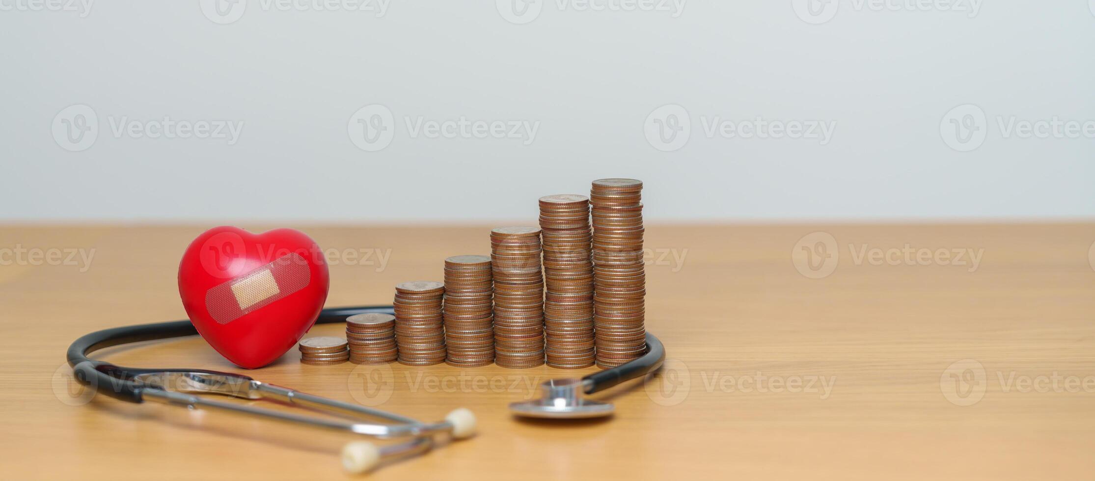 Money Saving, Health Insurance, Medical, Donation and Financial concepts. coins stack with stethoscope and Heart, Money stack Counting arrangement for deposit and Healthcare cost photo