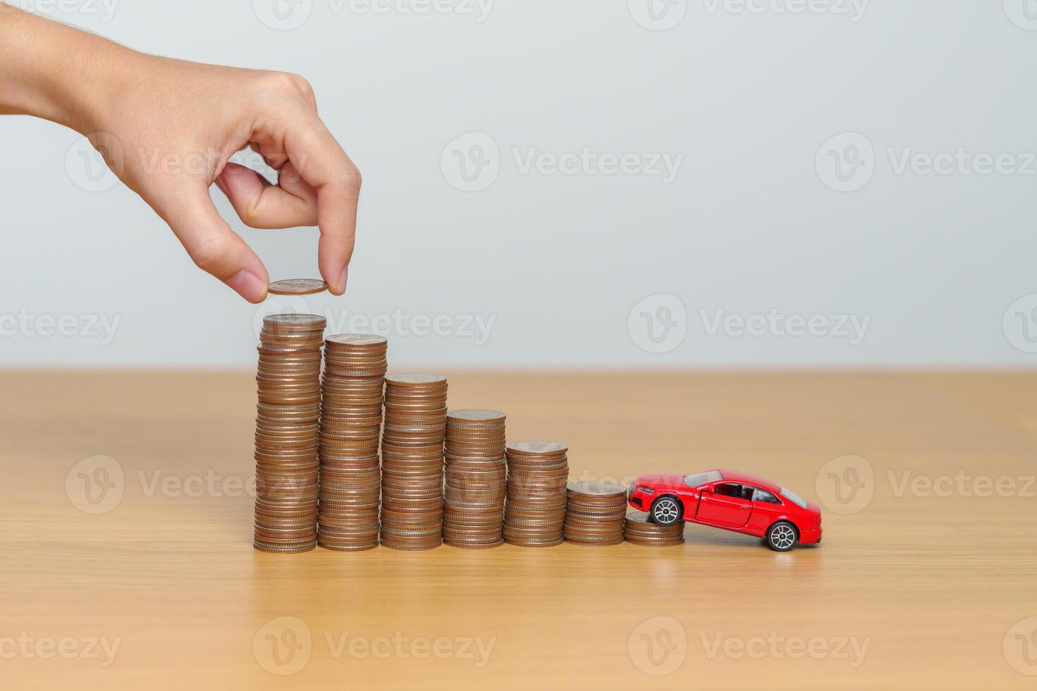 Money Saving, Car Insurance, Financial, vehicle Repair and Maintenance concepts. coins stack and piggy bank with Auto model, Money stack Counting arrangement for deposit and Automobile Tax photo