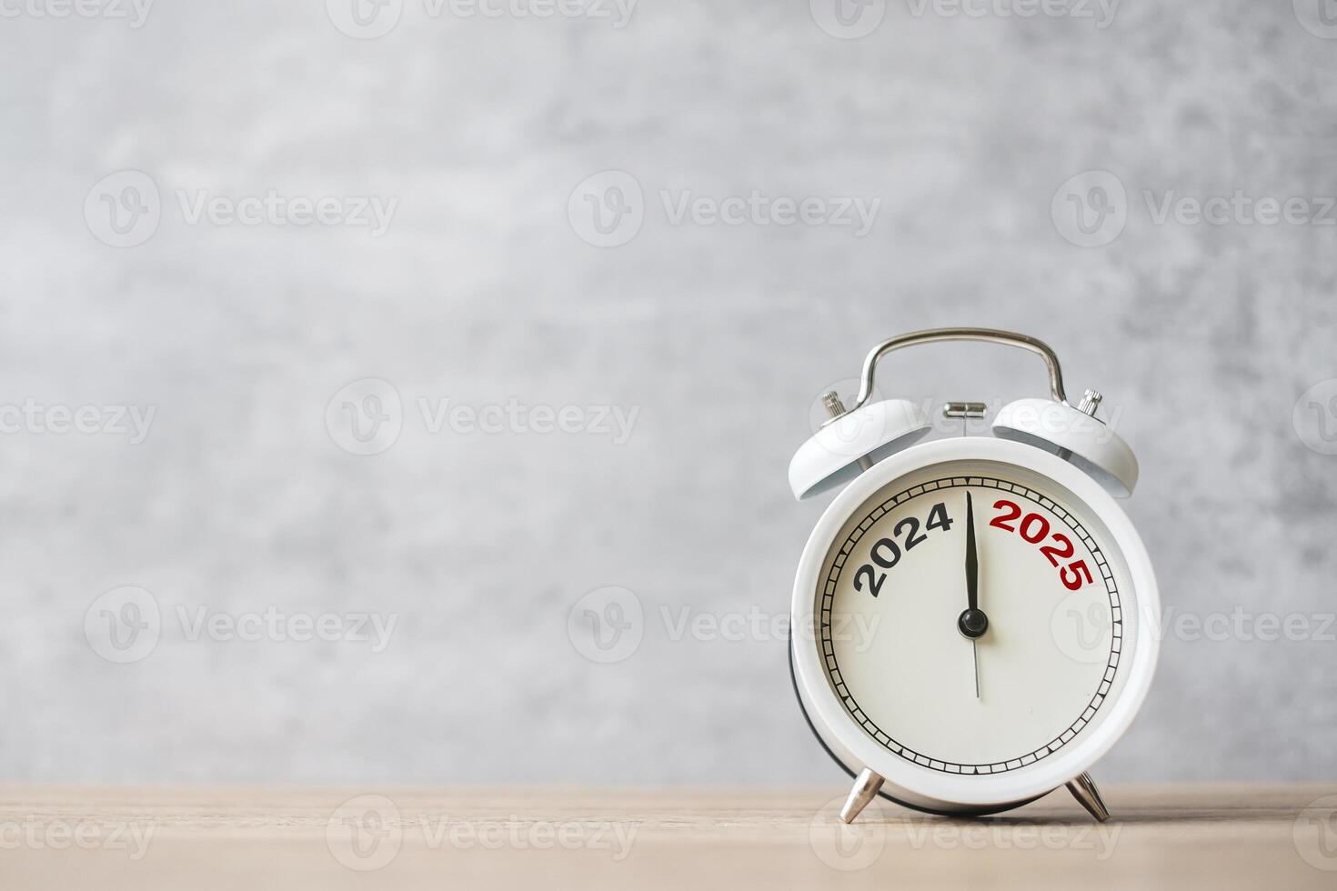 Happy New Year with vintage alarm clock and 2024 change to 2025 number. Merry Christmas, New Start, Resolution, countdown, Goals, Plan, Action and Mission Concept photo