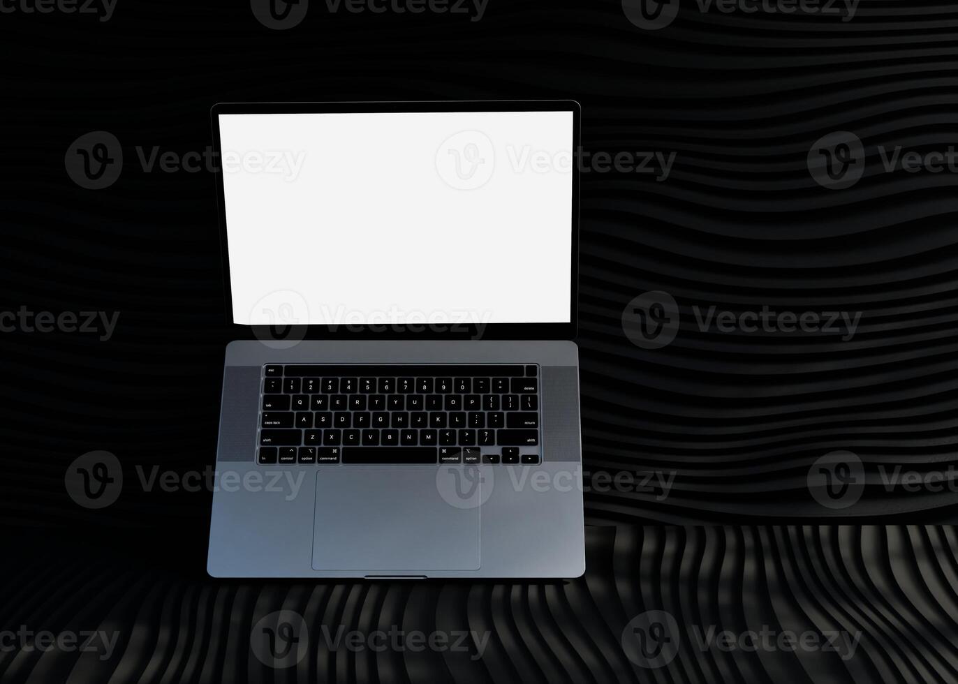 Laptop on black background photo