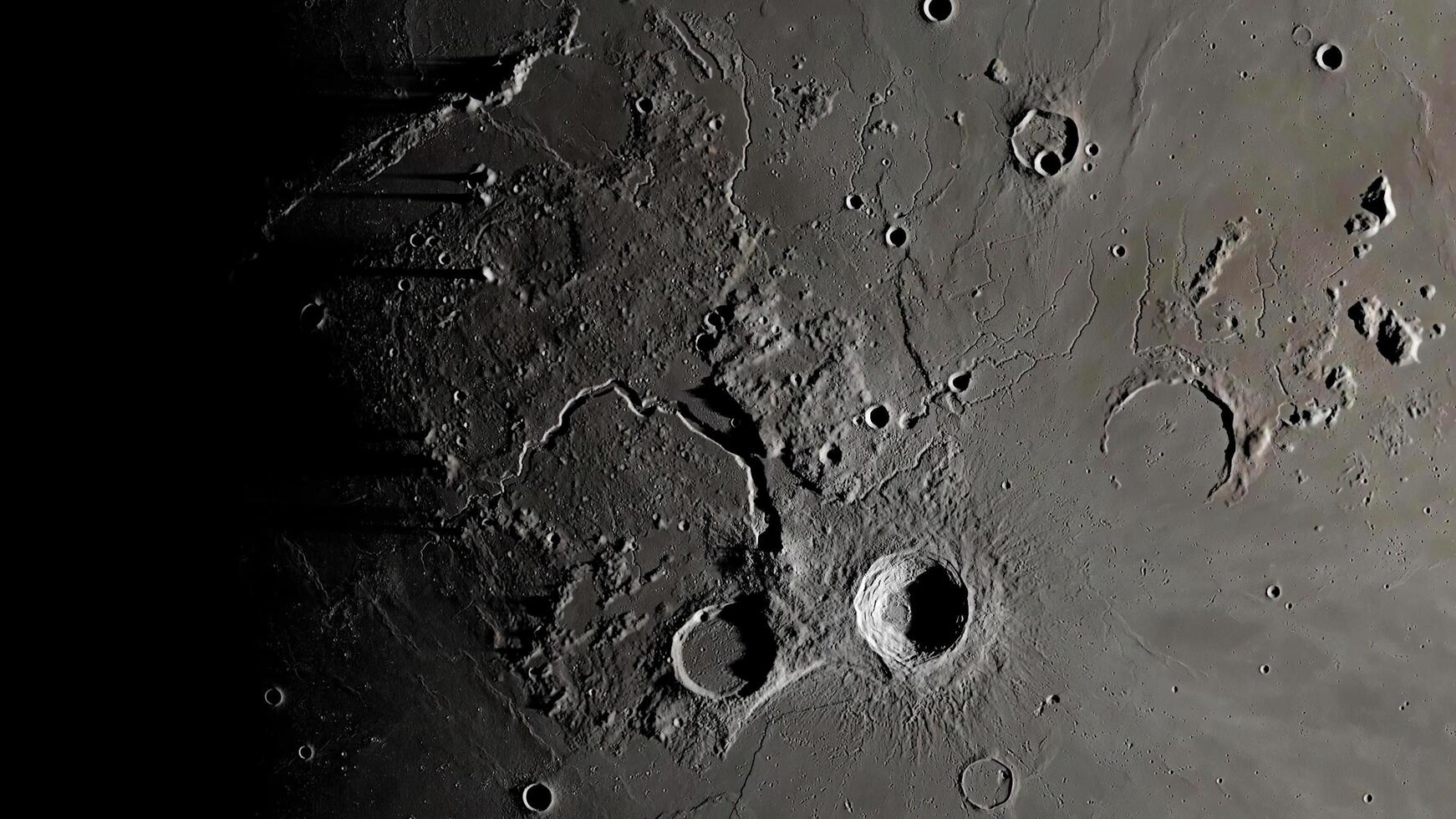 Moon surface close-up. Detailed lunar craters on the surface of the moon. Moon surface background. photo