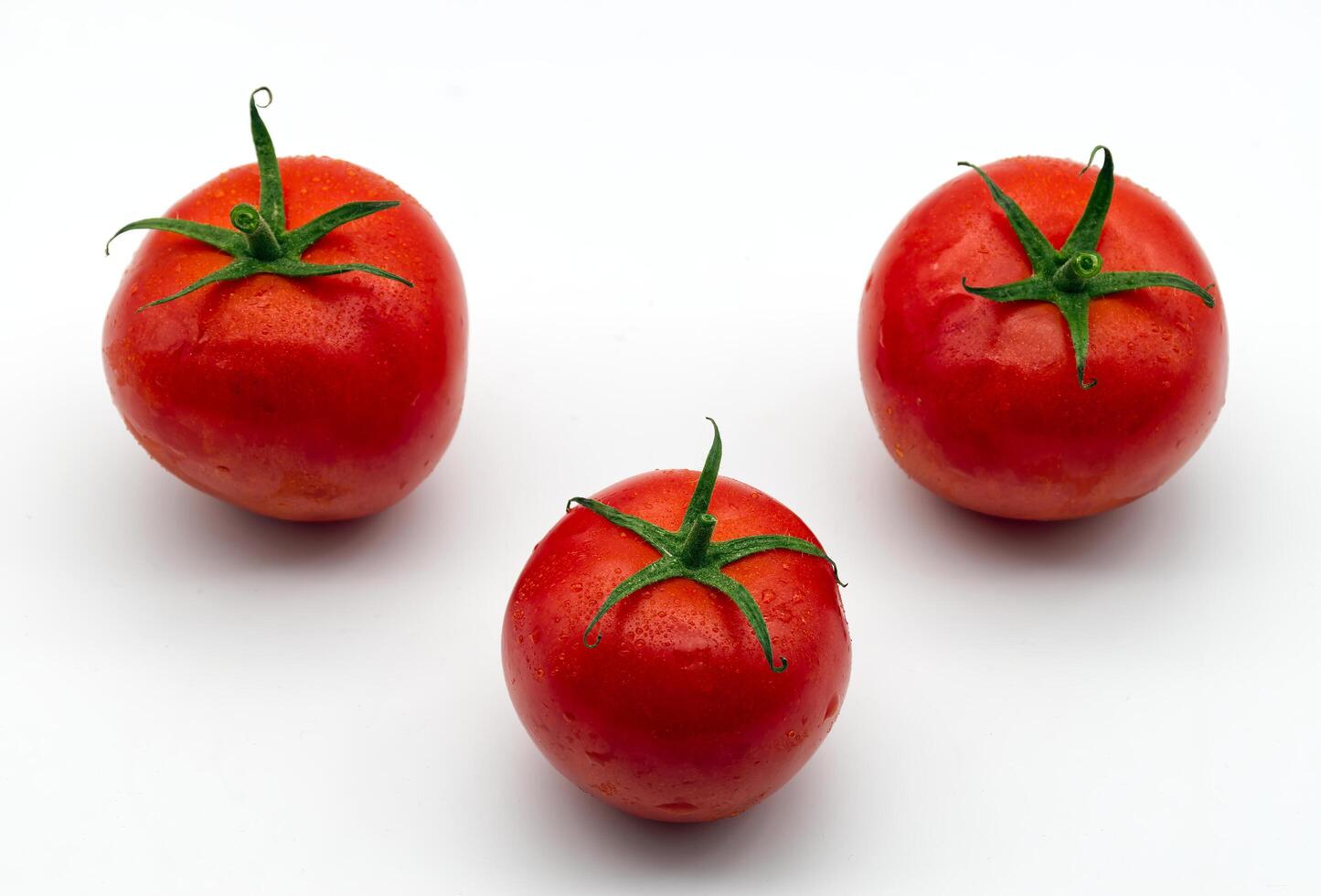 Fresh red cherry Italian tomatoes isolated on white background. photo