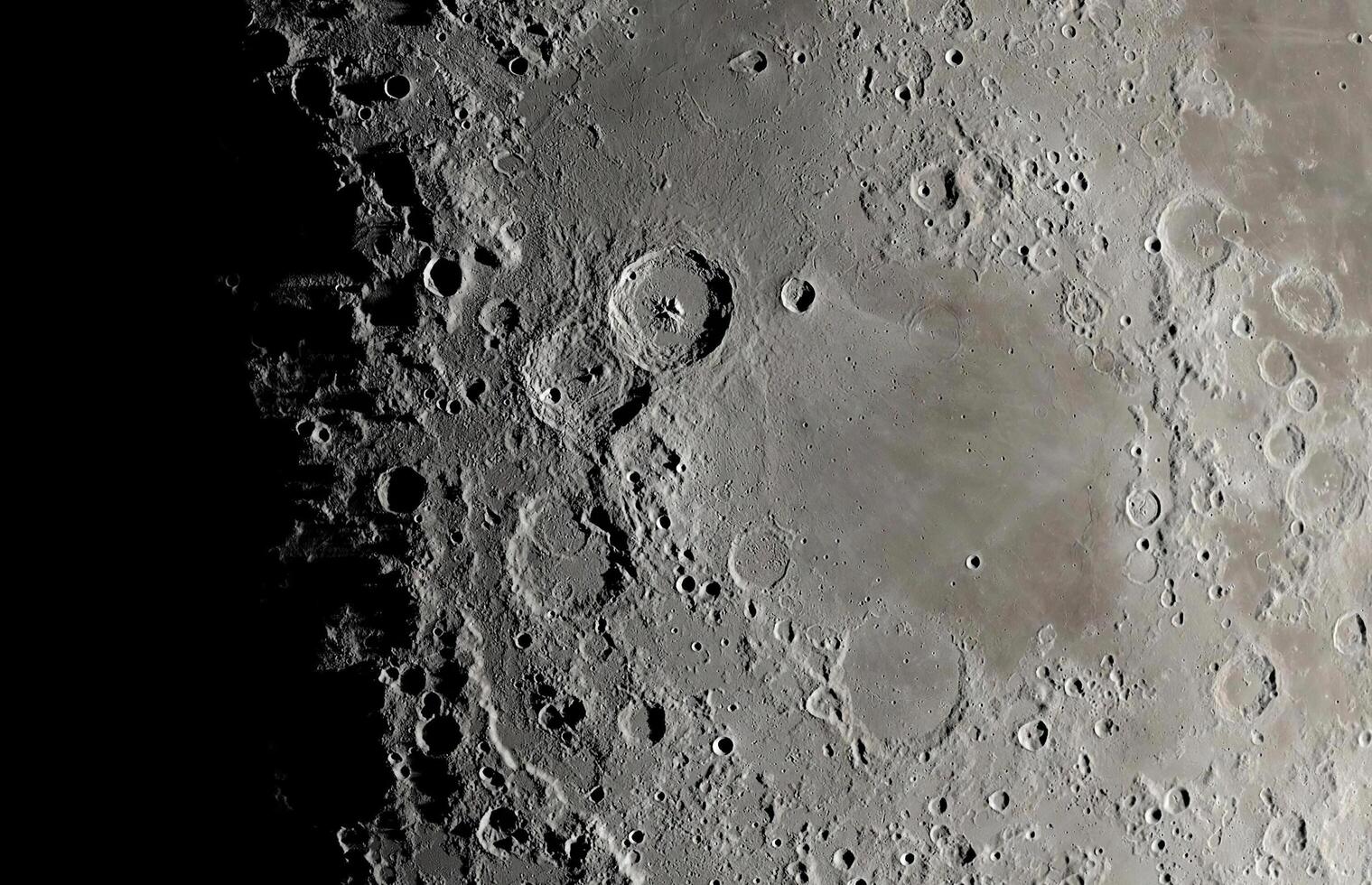 Moon surface close-up. Detailed lunar craters on the surface of the moon. Moon surface background. photo