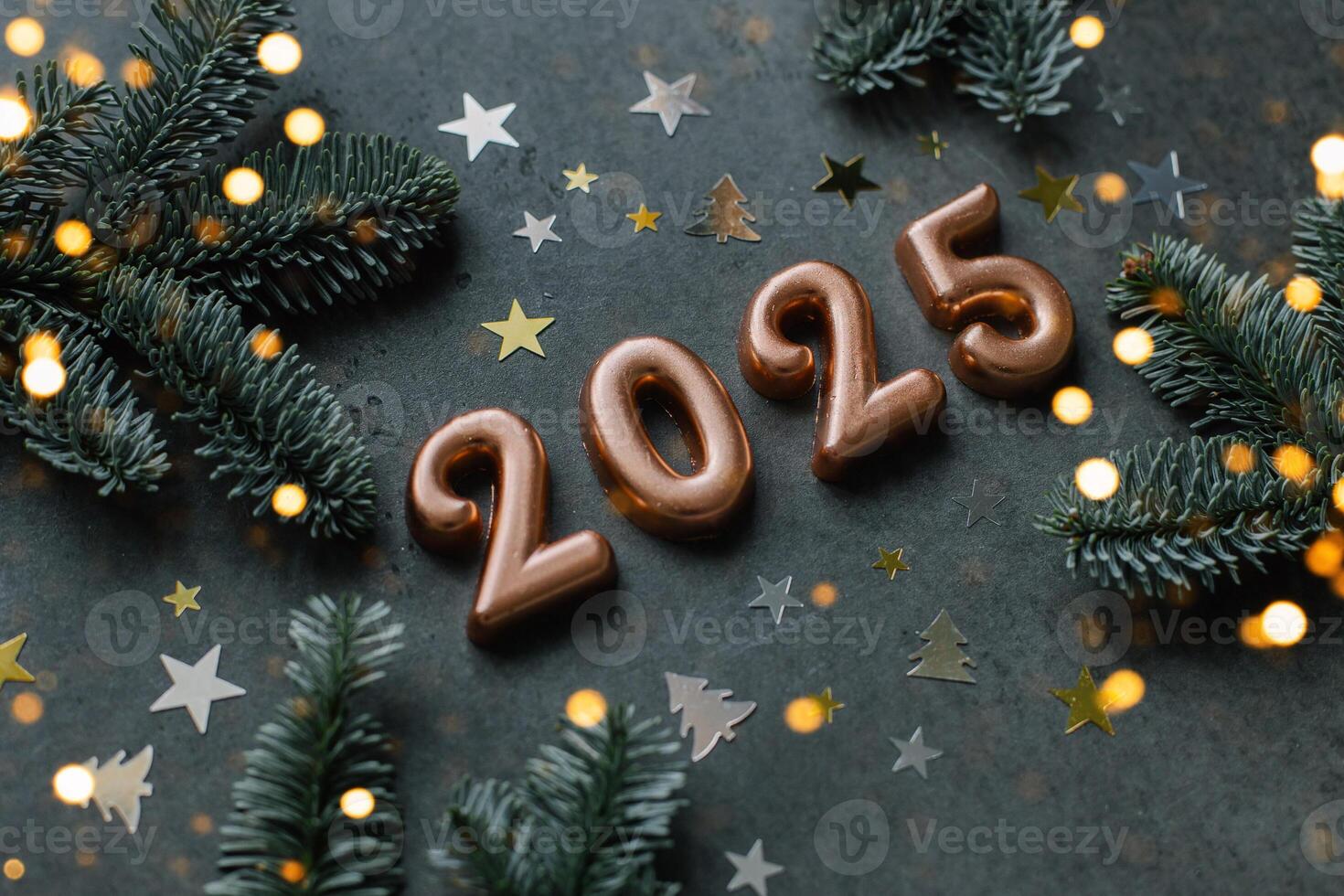 Christmas and New Year Greeting Card. Number 2025 on dark background. Holiday lights bokeh background. Happy New Year 2025 Concept photo