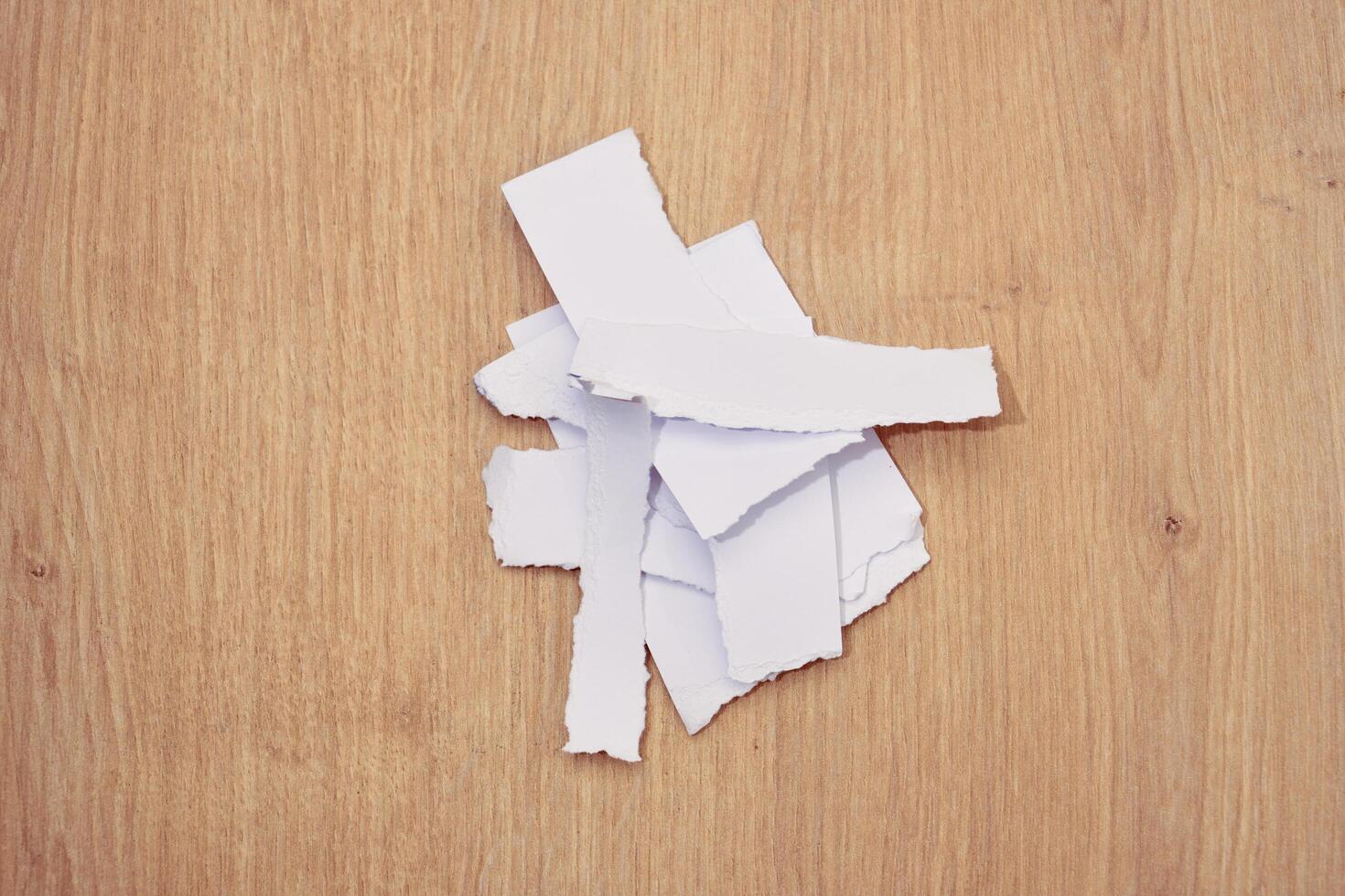 Torn a 4 paper on the table photo