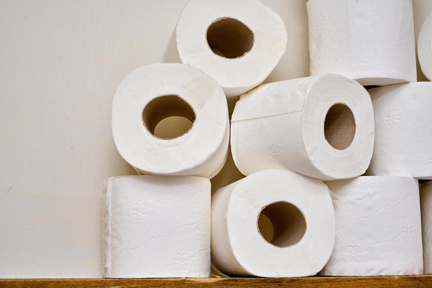 Pile of toilet paper in wc photo