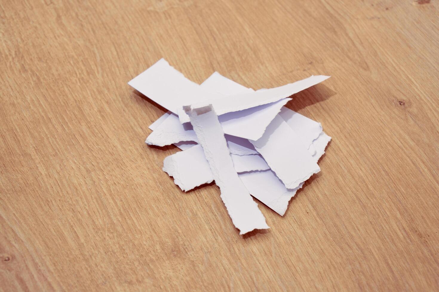 Torn a 4 paper on the table photo