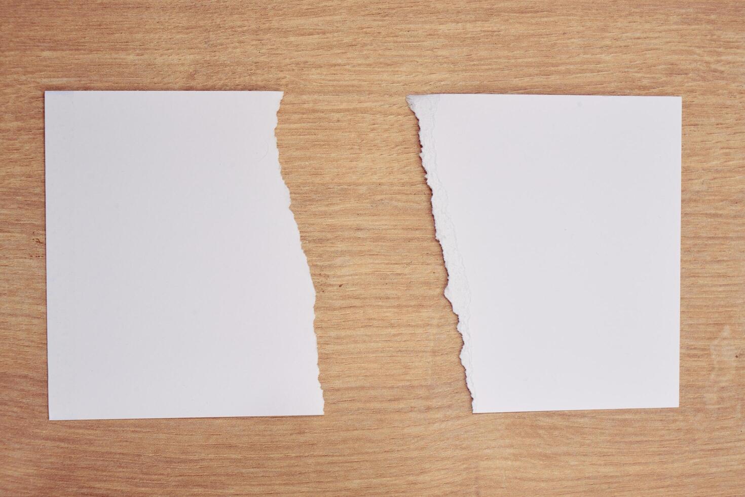 Torn a 4 paper on the table photo