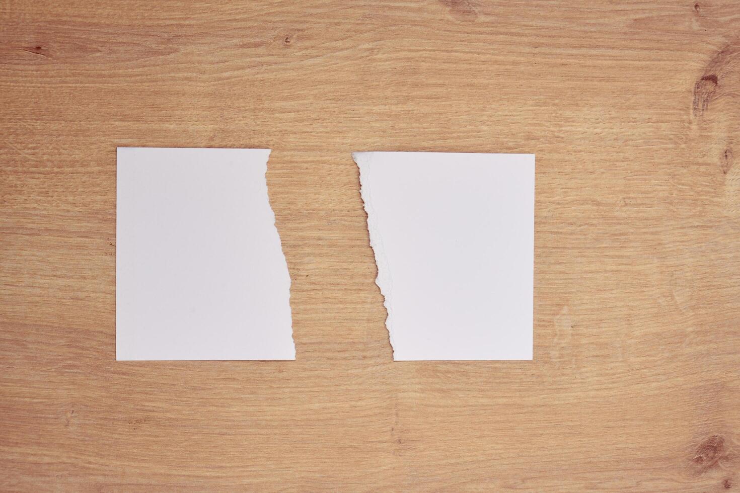 Torn a 4 paper on the table photo