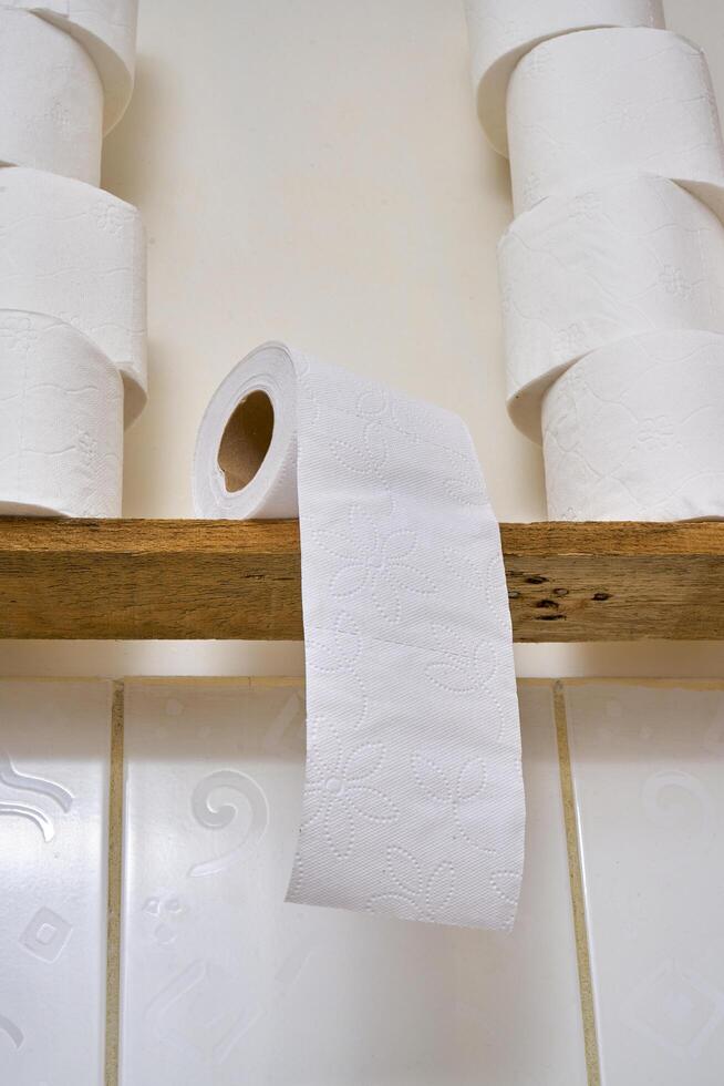 Pile of toilet paper in wc photo