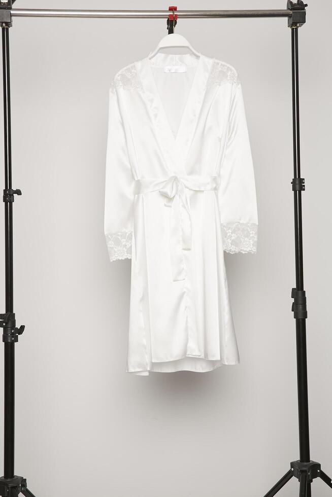 Satin women nighty on a white background. photo