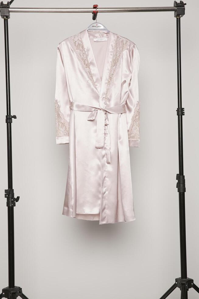 Satin women nighty on a white background. photo