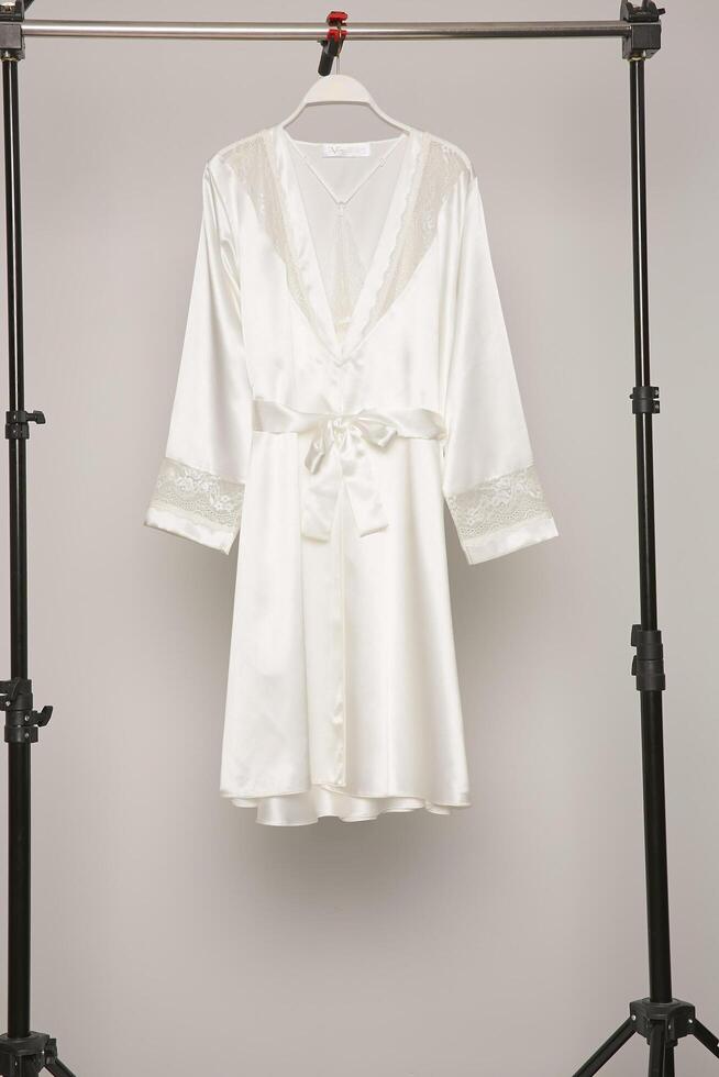 Satin women nighty on a white background. photo