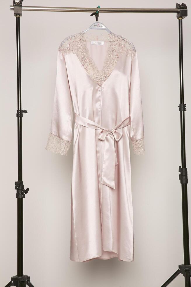 Satin women nighty on a white background. photo