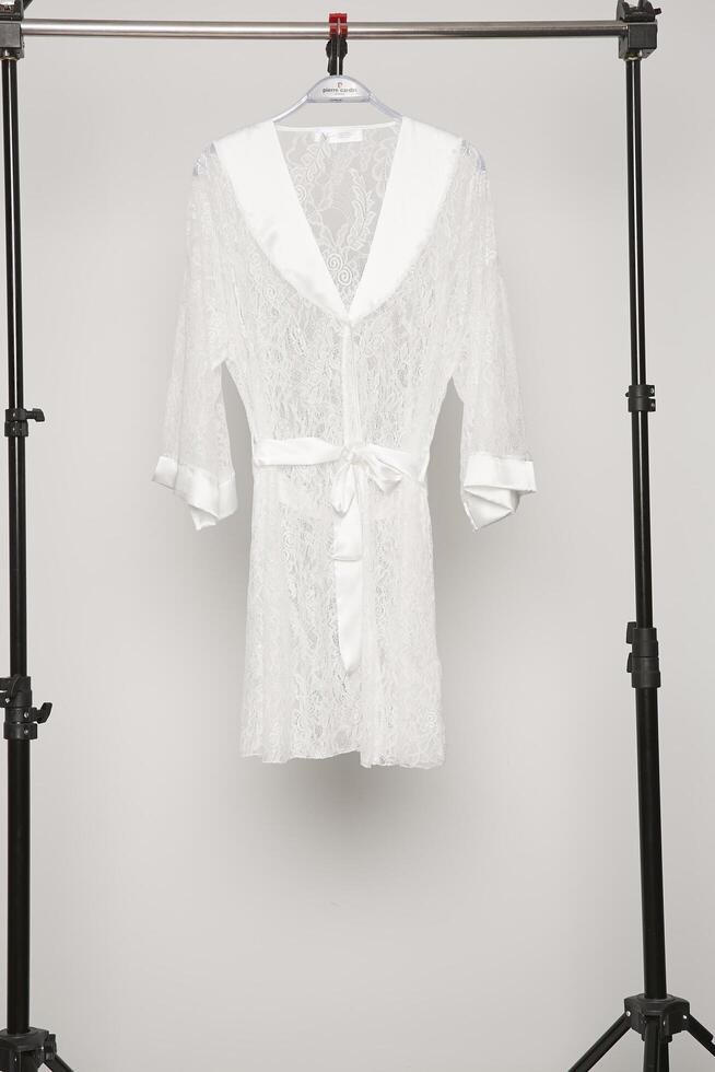 Satin women nighty on a white background. photo
