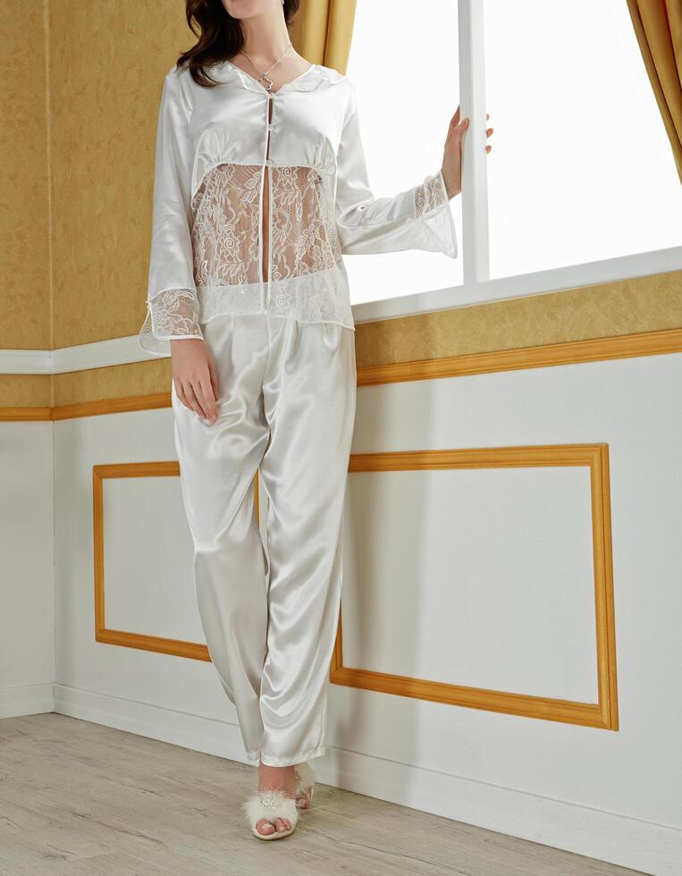 Female fashion model wearing a satin nighty photo