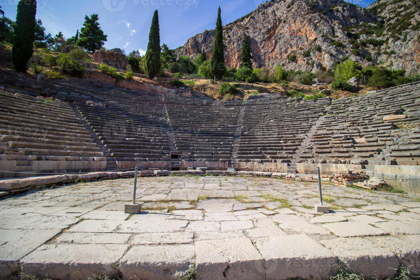 Ancient amphitheater of Delphi. Famous Archaeological site in Greece. God of Appollo temple. View of the ancient amphitheater. photo