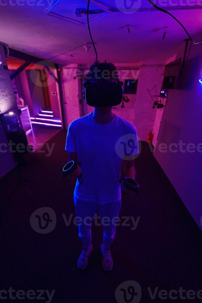 The player plays the game using virtual reality. Neon style. photo