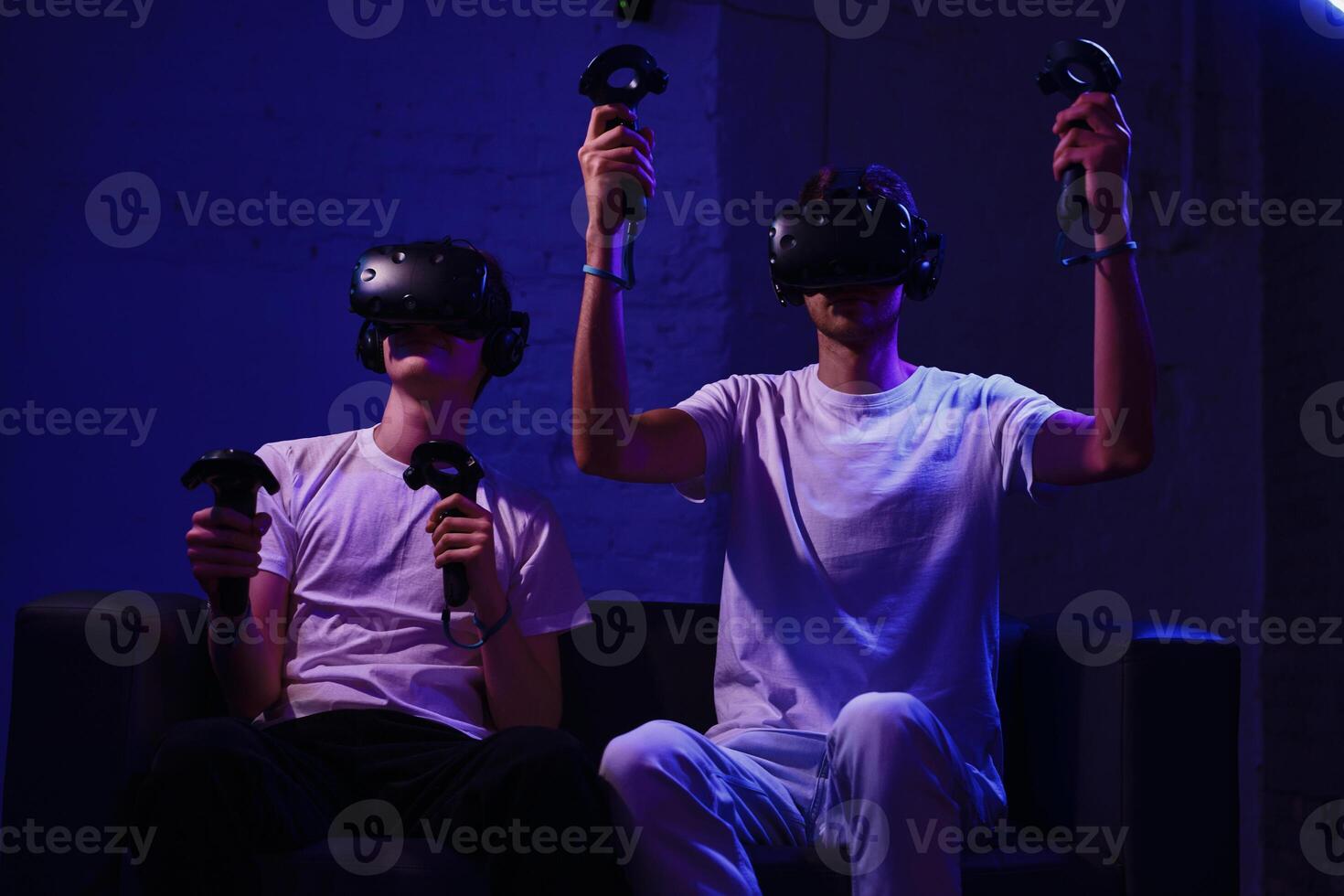 The player plays the game using virtual reality. Neon style. photo