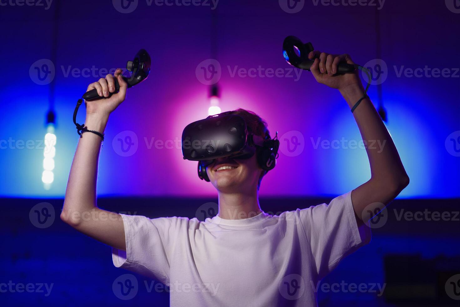 The player plays the game using virtual reality. Neon style. photo