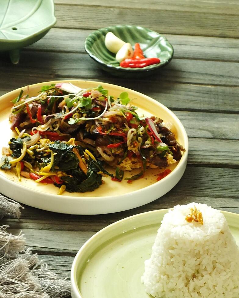 Assorted asian food set. Rice with side dishes on the wooden table. Top view. enjoy meal Time moment restaurant concept. Asian style banquet photo