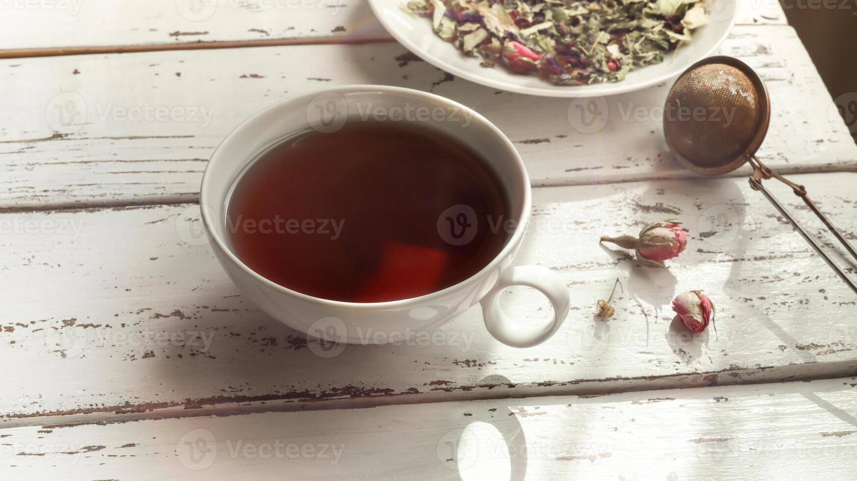 A cup with herbal tea photo