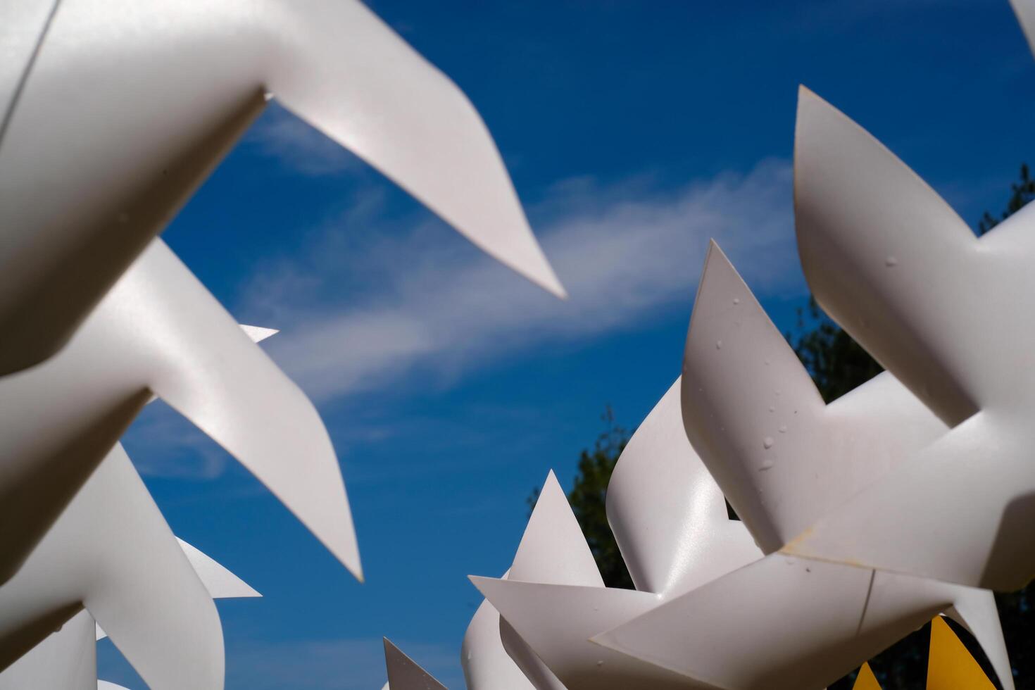 Photography of several Pinwheels hanging from a string. Background of ornaments that decorate the amusement park. Graphic Resources. Background Photography. Travel Destinations photo