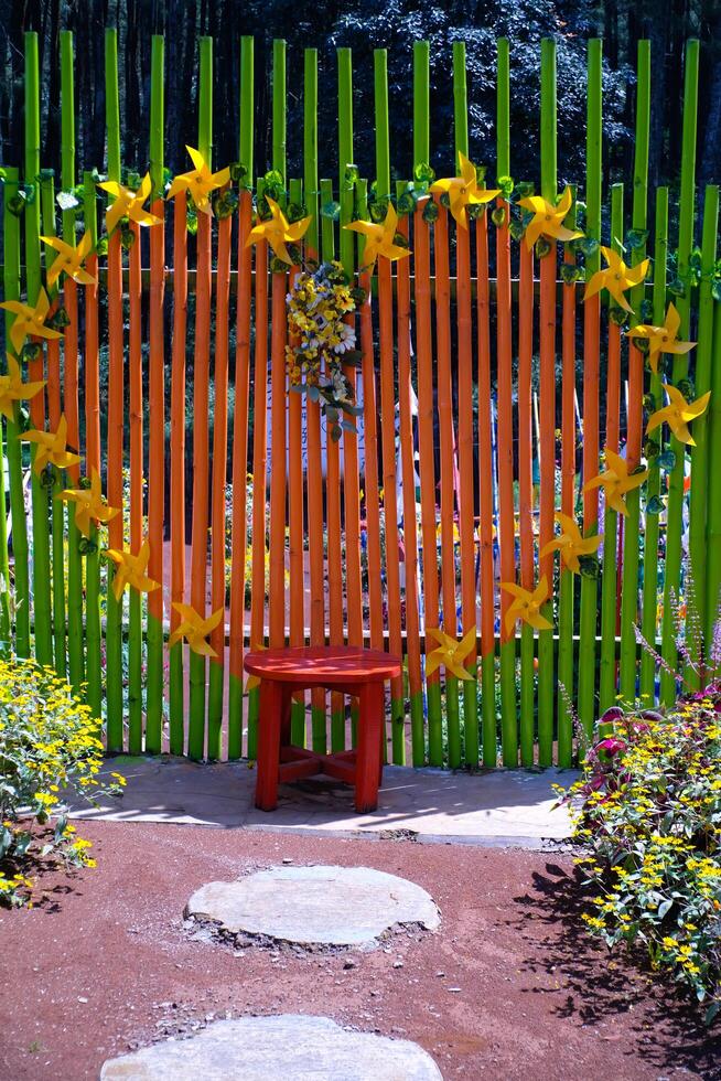 A large heart-shaped photo stall in the middle of the park. Background of ornaments that decorate the amusement park. Graphic Resources. Background Photography. Travel Destinations