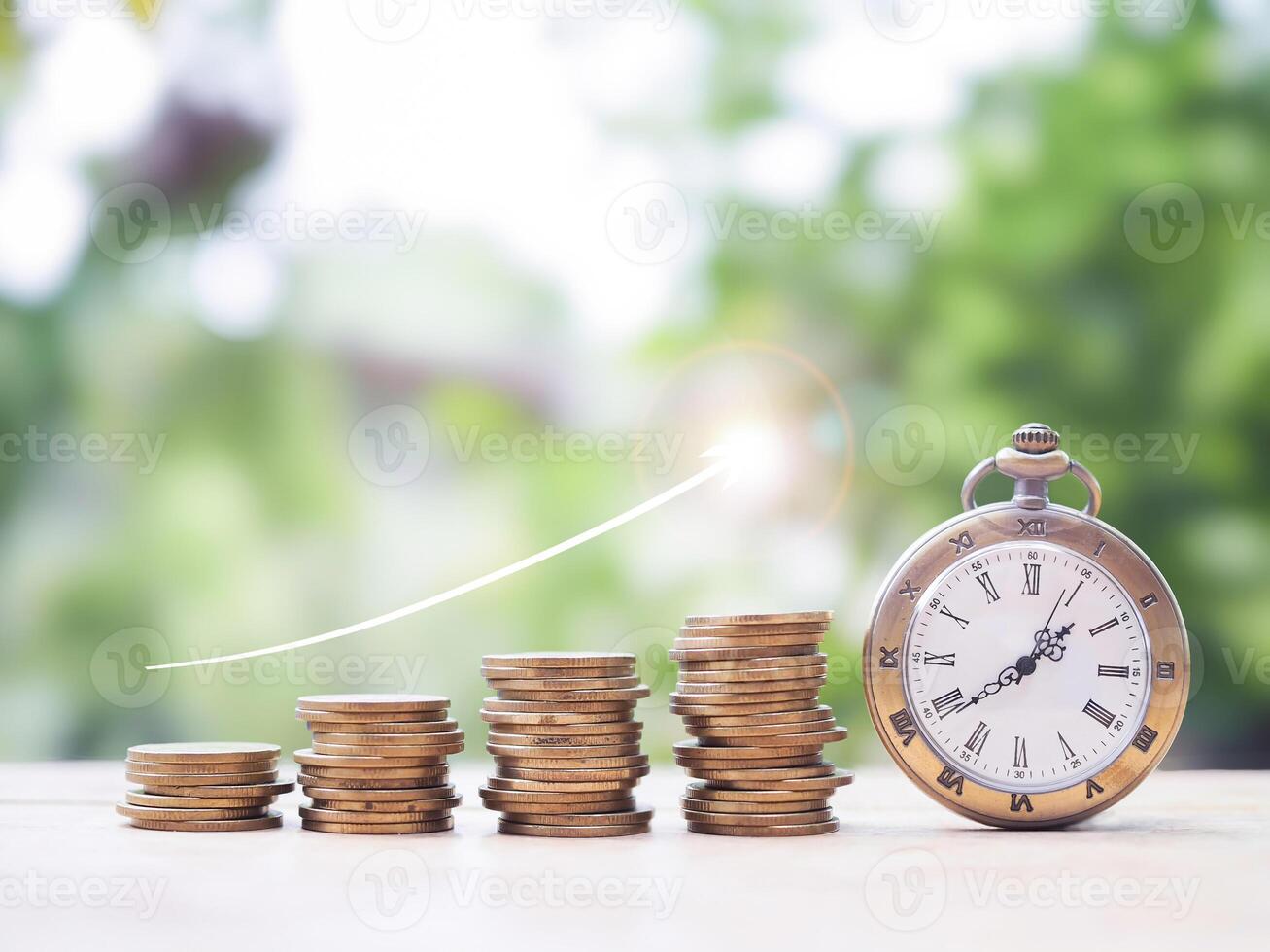 Vintage watch and stack of coins with arrow rising up. The concept of saving money for manage time to success business. photo