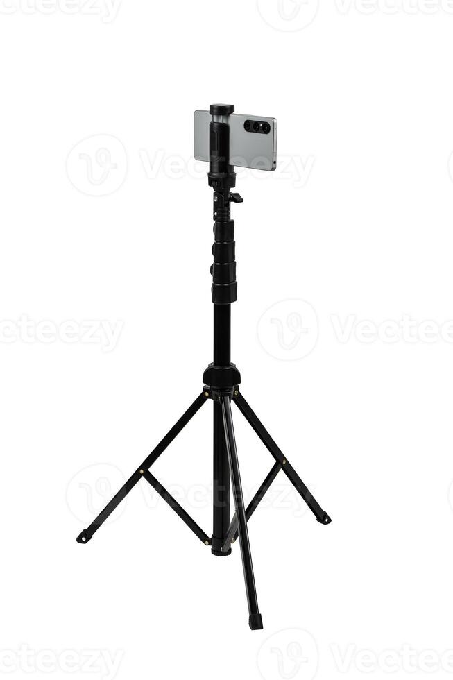 Smartphone mounted on a tripod. Stable photo or shooting for a blog or social media content. Isolate on a white back.