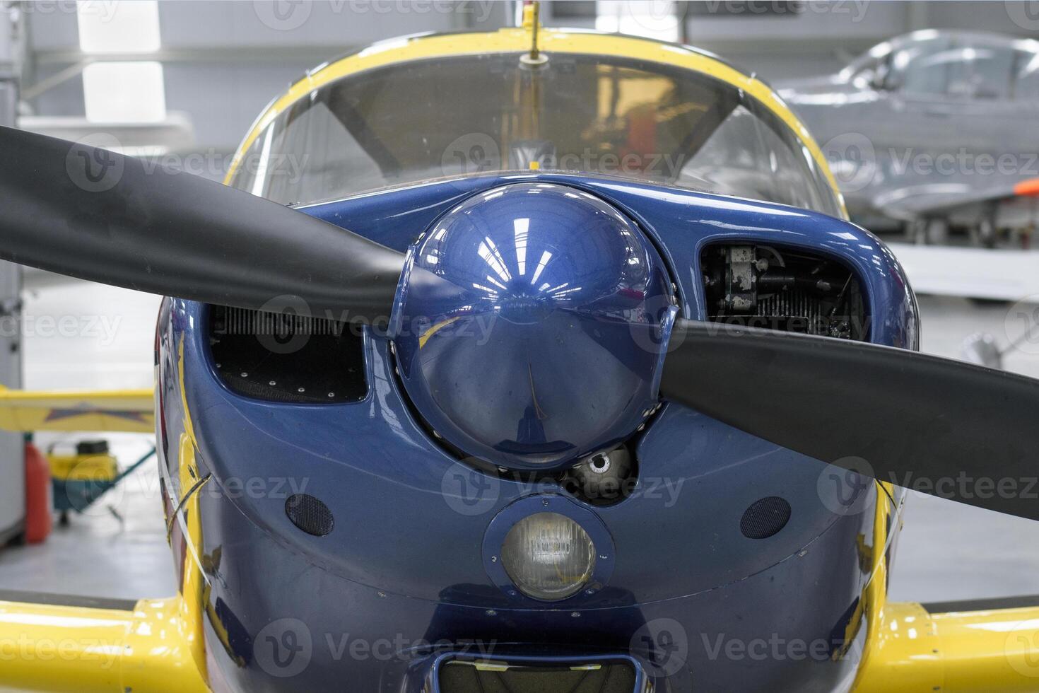 Propeller on light aircraft close-up, screws, texture, blue color surface photo