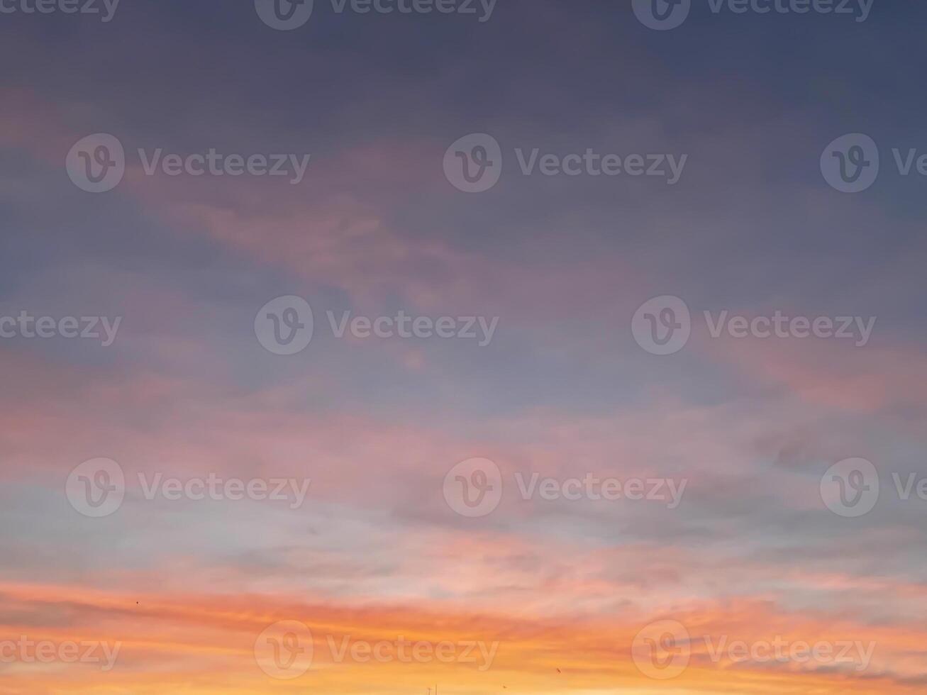 Sunset sky with colorful clouds background concept. Evening sunset. Twilight sky. photo